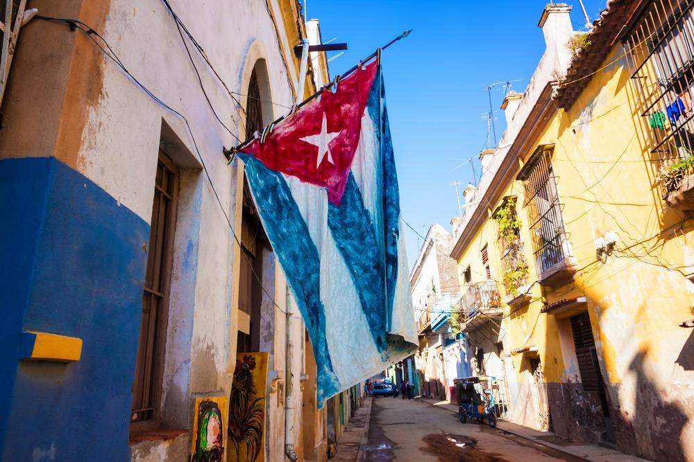 picture of the Cuban flag hanging in the street